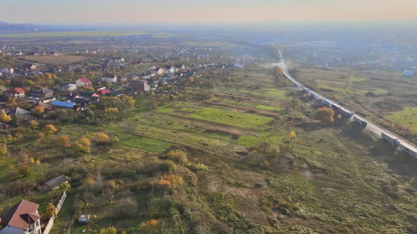 Overview to Small Village in Autumn Day alt