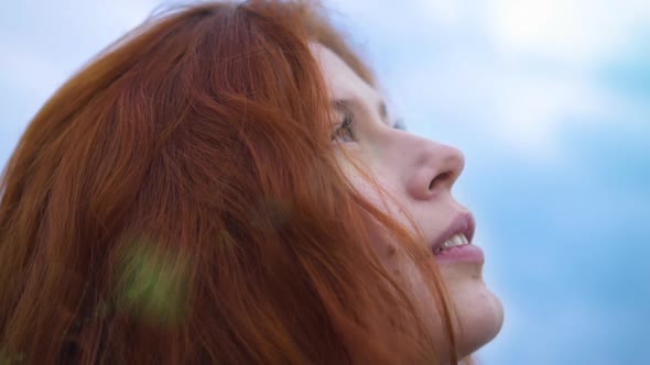  Beautiful Redhead Woman Exploring Spirituality Looking up Praying Сlose up Portrait  alt