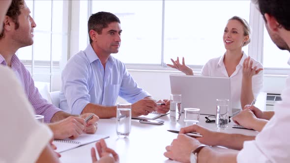 Team of Creative Designers Discussing alt