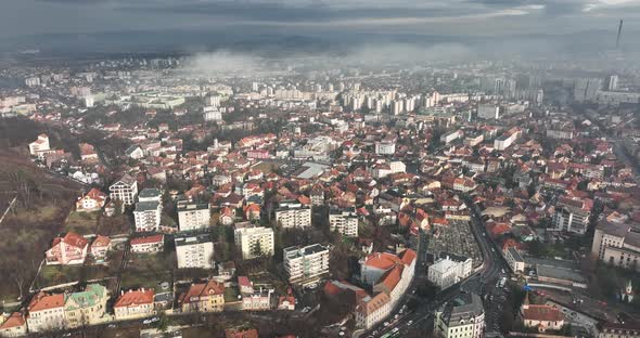 Brasov City Under a Cloud of Fog