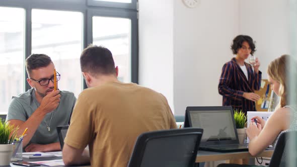 Business Team or Startuppers Working at Office alt