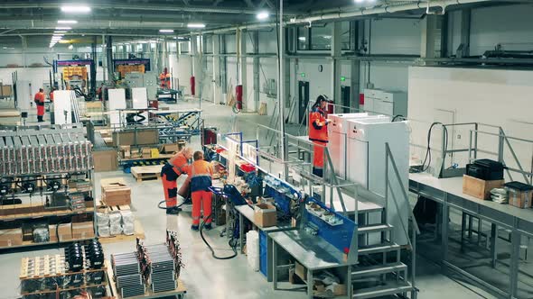 Female Engineers Are Manufacturing Fridges in the Factory Unit alt