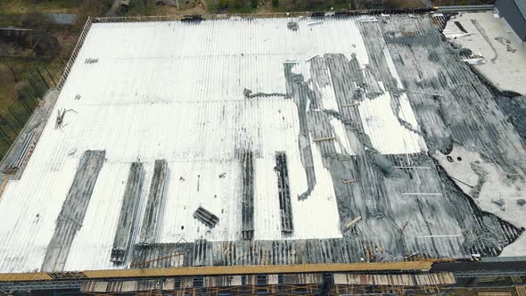 Aerial View Damaged Roof of an Industrial Building After a Fire alt