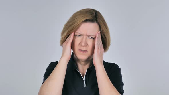 Portrait of Old Woman Gesturing Headache, Stress alt