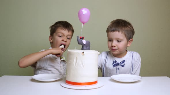 A red banded birthday cake. Pastry shop advertisment. Children eating birthday cake
