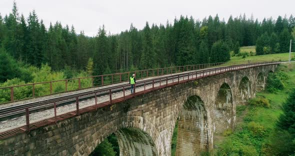 Aerial Shot Construction Worker on Railways alt