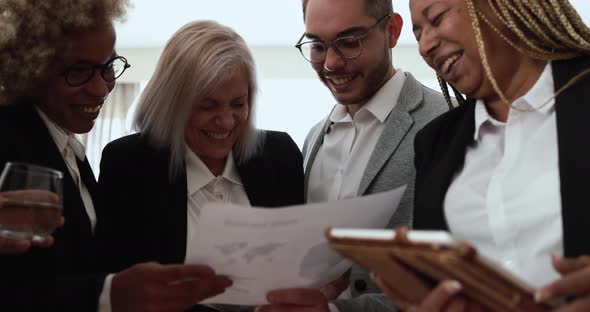 Multiracial business people working inside modern bank office alt