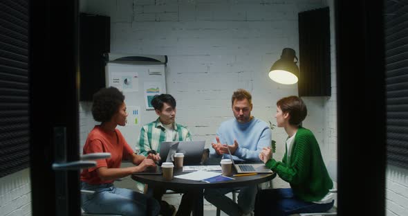 A Group of People are Talking Discussing the Creation of a New Business alt