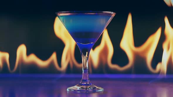 Cocktail on Fire on a Bar alt