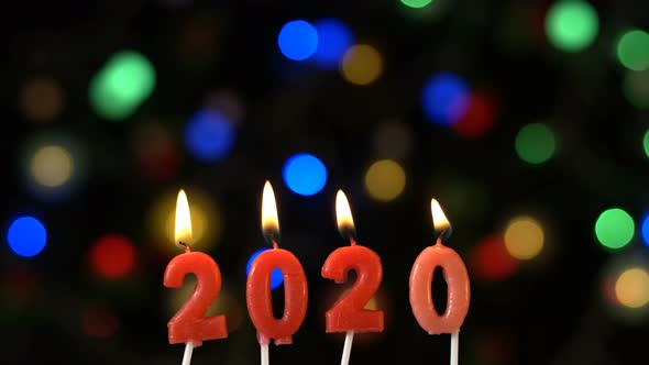 New Year 2020 Candle And Bokeh  alt