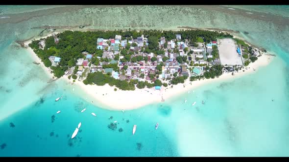 Aerial panorama of luxury tourist beach journey by blue lagoon with white sandy background of a dayo alt