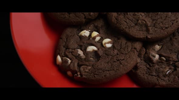 Cinematic, Rotating Shot of Cookies on a Plate alt