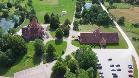 Jaunmoku Brick Medieval Castle Near Tukums, Latvia  Aerial Dron 4k Shot Jaunmokas Manor Park alt