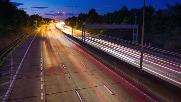 Car Lights at Rush Hour on an Motorway Junction alt