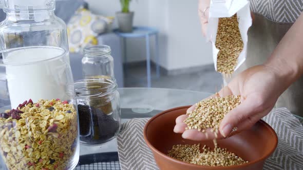 Woman Sorting Different Kind of Healthy Seeds