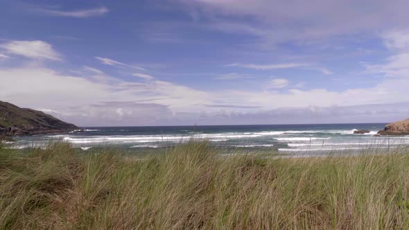 Deserted island with sand, rocks and ocean 7 alt