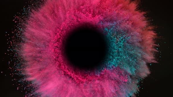 Super Slow Motion Shot of Color Powder Vortex Isolated on Black Background  alt