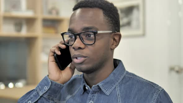 Afro-American Man Talking on Phone alt