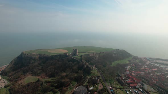 Massive Promontory With Scarborough Castle Overlooking The North Sea and Scarborough, North Yorkshir alt