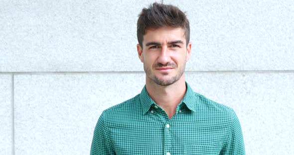 Man smile to camera alt