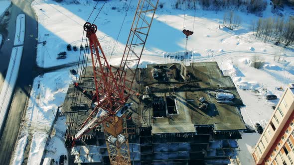 Construction Site in the City with Snowy Roads alt