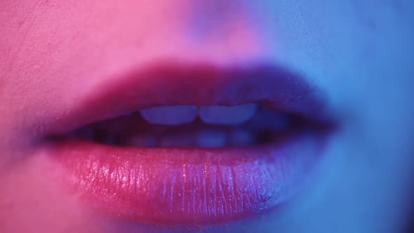 Sexy Female Lips in Neon Light alt