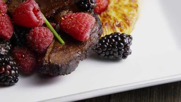 Rotating - smoked duck bacon with grilled pineapple, raspberries, blackberries and honey alt