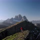 Aerial Unveil Man Hiker In Front of Pelmo Mountain in Dolomites Italy - VideoHive Item for Sale