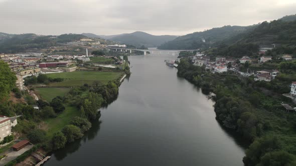 Tãmega and Douro River against mountains and sky, Entre-os-Rios, Portugal