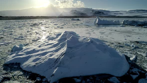 Flying Above Floating Icebergs