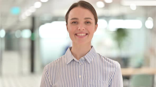 Portrait of Beautiful Woman Doing Video Chat alt