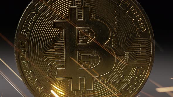 Cryptocurrency on the block chain - close up of bitcoin altcoin physical coins in dynamic setting alt