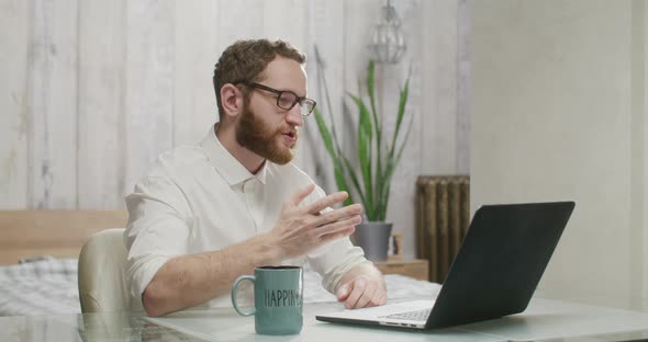 Serious Man During Video Conference Starts Dancing with Maracas