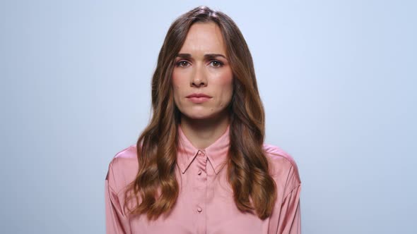 Serious Businesswoman Waving Head No at Camera. Upset Woman Standing in Studio alt