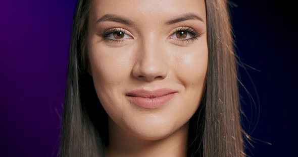 A Closeup Portrait of a Woman Looking Forwards alt
