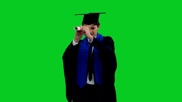 Graduate Looking To The Bright Future Through Diploma And Showing Thumbs Up