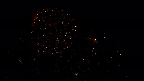Many flashing colourful fireworks in event amazing with black background. alt