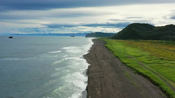 Beach with Black Sand on Kamchatka alt