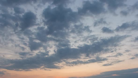Clouds On Orange Sky During Sunrise, Time Lapse