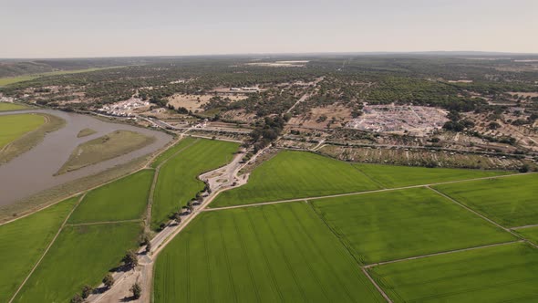 Aerial view with Portuguese countryside along the Sado River in Portugal. alt