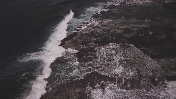 Slowmotion waves hitting the coast