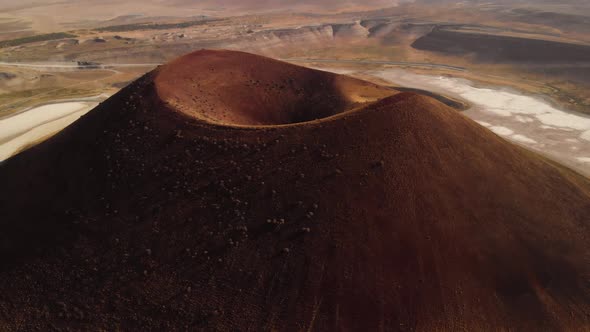 Aerial View of Red Volcano Caldera on Planet Mars alt