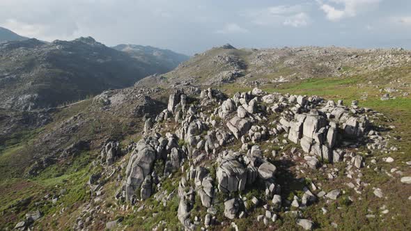 Aerial forward view over rocks at mountains of National park Geres. Portugal