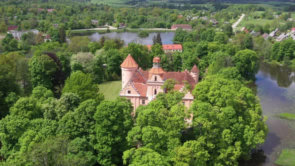 Aerial Drone footage of scenic Edole Castle in Ēdole parish, Latvia alt
