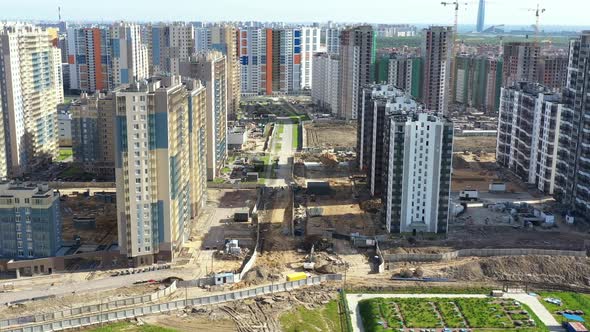 New and Unfinished Houses at Construction Site alt