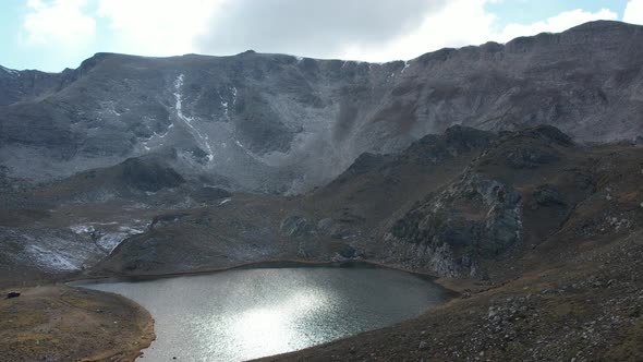 a lake between mountains