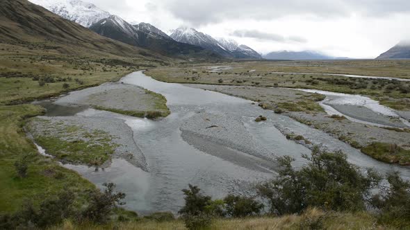 Tasman River and depressing cloudscape near Mount Cook, New Zealand