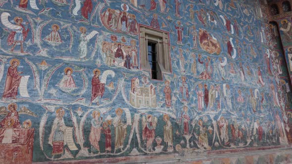 Blue Painted Wall Of Orthodox Church - Voronet Monastery In Woronet, Romania alt