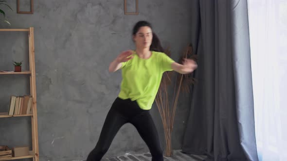 Latin Woman Active Sports Training at Home Exercise for Pumping Arms and Legs alt