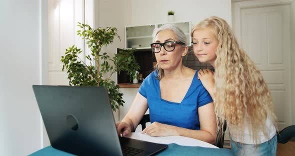 Grandmother Granddaughter Laptop Home